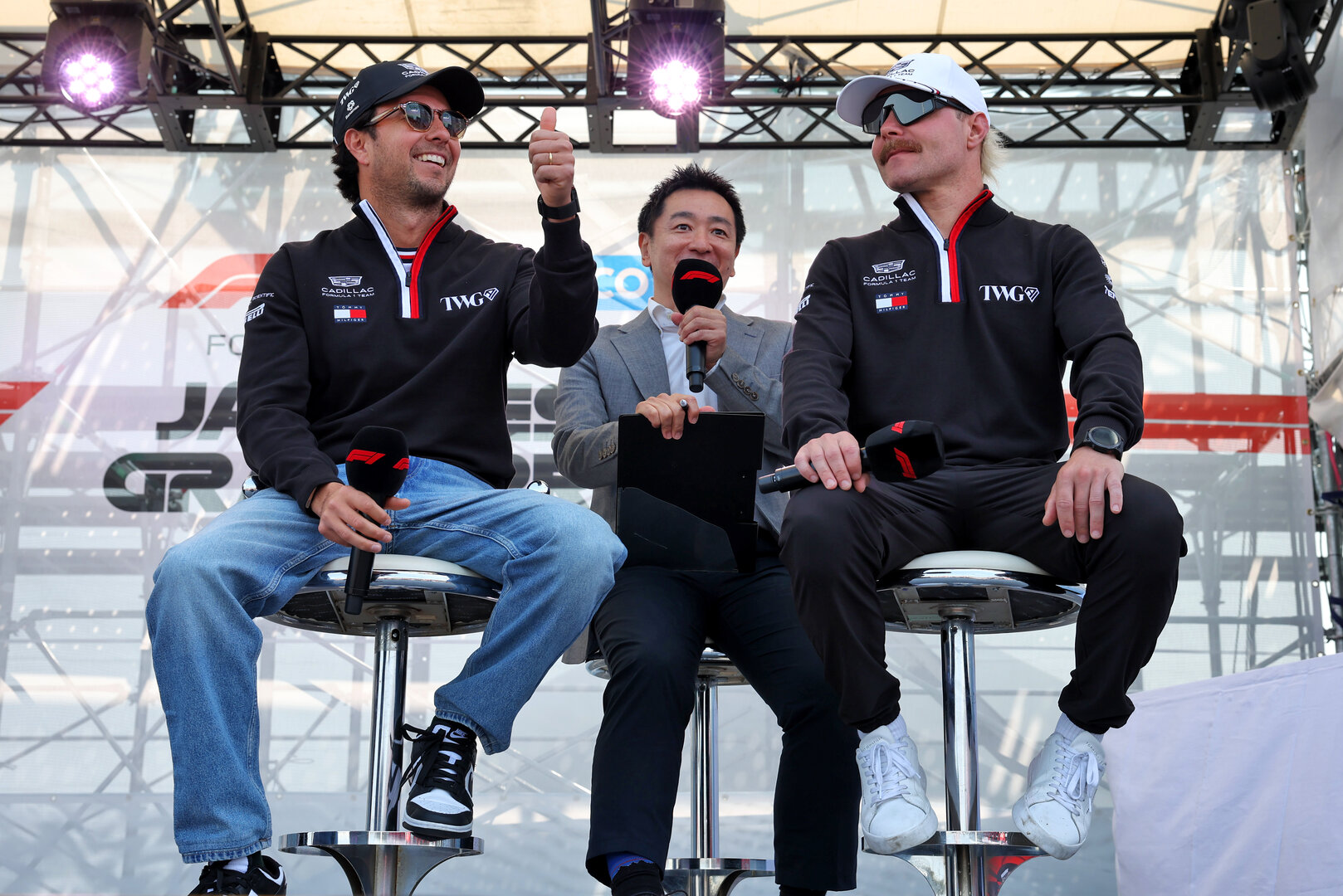 GP GIAPPONE, (L to R): Sergio Perez (MEX) Cadillac Formula 1 Team e Valtteri Bottas (FIN) Cadillac Formula 1 Team, on the FanZone Stage.
28.03.2026. Formula 1 World Championship, Rd 3, Japanese Grand Prix, Suzuka, Japan, Qualifiche Day.
 - www.xpbimages.com, EMail: requests@xpbimages.com © Copyright: Rew / XPB Images