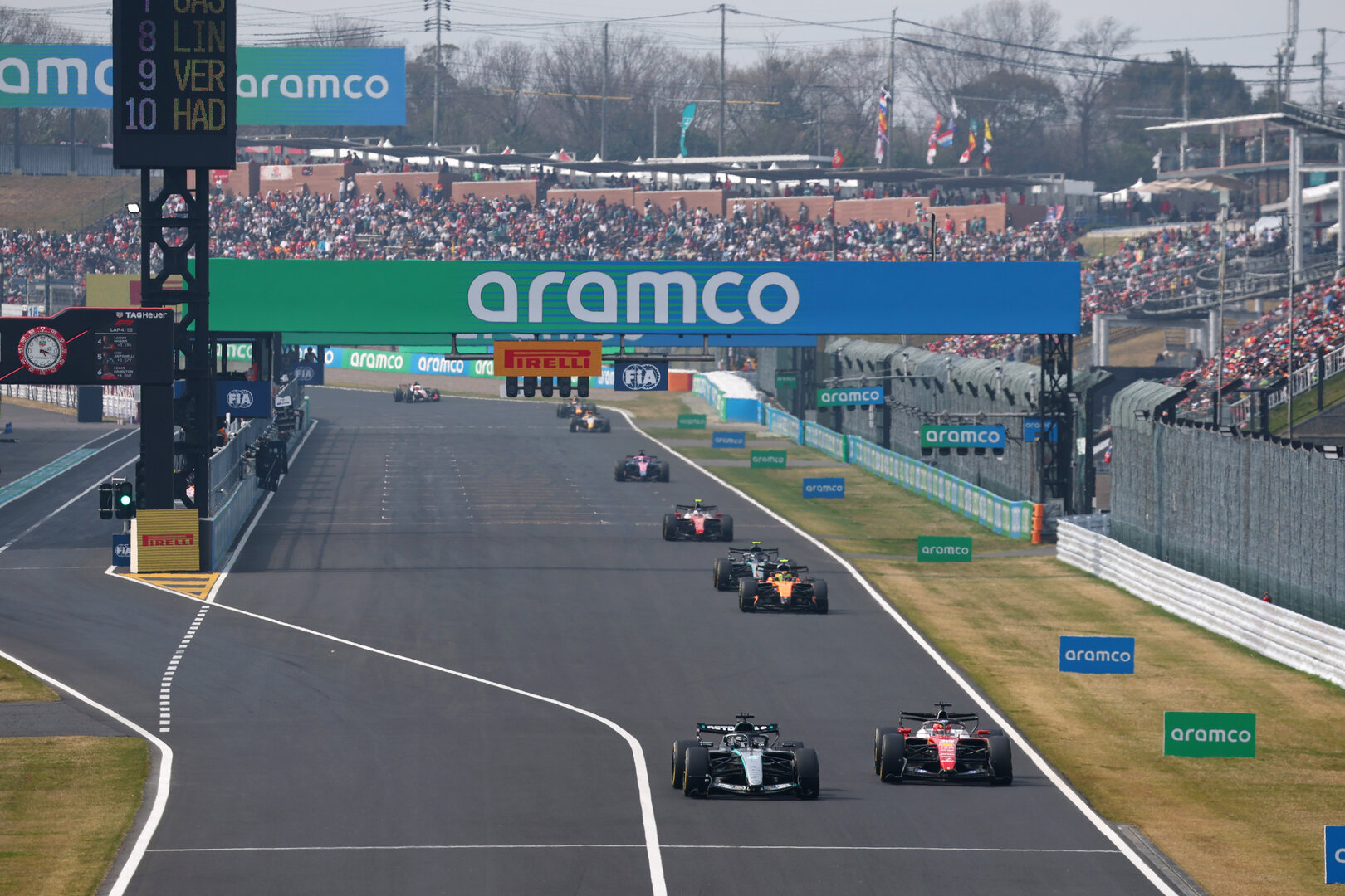 GP GIAPPONE, George Russell (GBR) Mercedes AMG Formula One Team W17 e Charles Leclerc (MON) Ferrari SF-26.
29.03.2026. Formula 1 World Championship, Rd 3, Japanese Grand Prix, Suzuka, Japan, Gara Day.
- www.xpbimages.com, EMail: requests@xpbimages.com © Copyright: Bearne / XPB Images