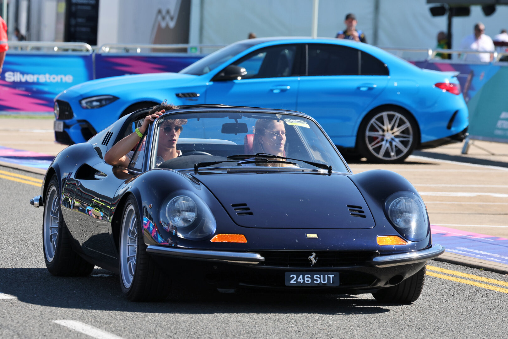 GP GRAN BRETAGNA, (L to R): Oliver Bearman (GBR) Haas F1 Team arrives at the paddock with Domenica Alicia Torriani in a Ferrari Dino 246 GT.
02.07.2026. Formula 1 World Championship, Rd 9, British Grand Prix, Silverstone, England, Preparation Day.
- www.xpbimages.com, EMail: requests@xpbimages.com © Copyright: Moy / XPB Images