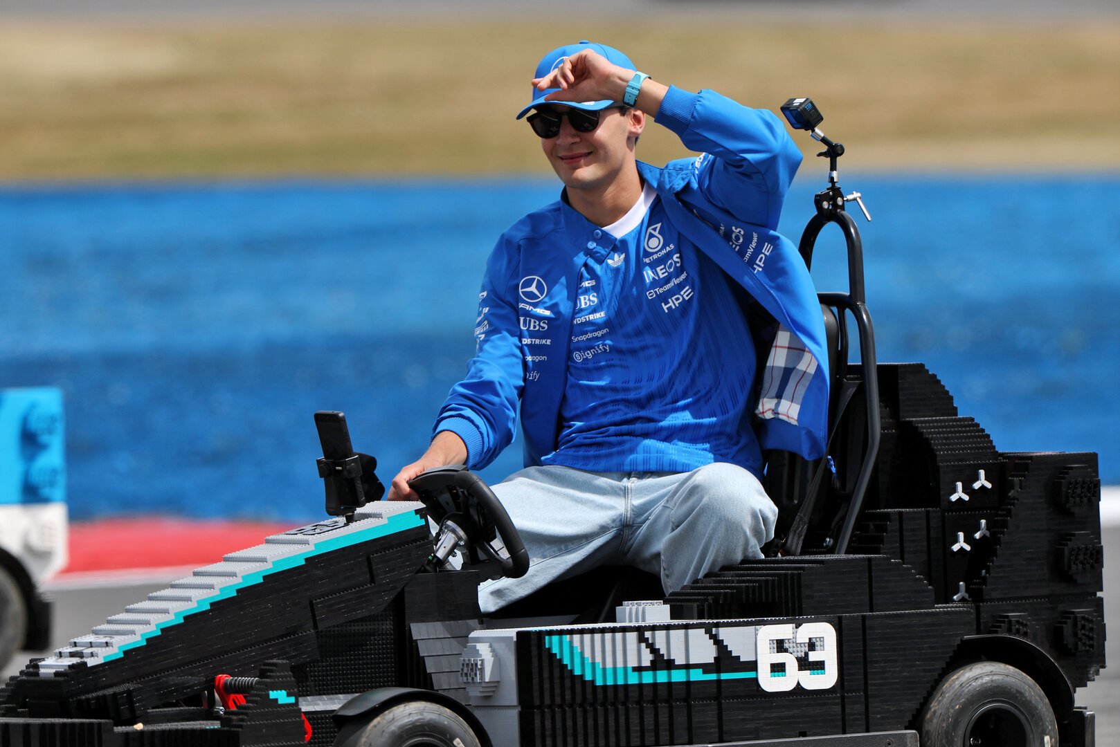 GP GRAN BRETAGNA, George Russell (GBR) Mercedes AMG Formula One Team in a Lego kart on the drivers' parade.
05.07.2026. Formula 1 World Championship, Rd 9, British Grand Prix, Silverstone, England, Gara Day.
- www.xpbimages.com, EMail: requests@xpbimages.com © Copyright: Charniaux / XPB Images