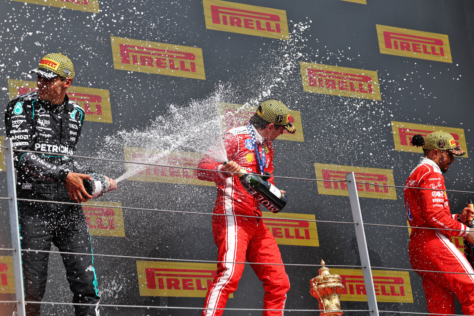 GP GRAN BRETAGNA, The podium (L to R): George Russell (GBR) Mercedes AMG Formula One Team, second; Charles Leclerc (MON) Ferrari, vincitore; Lewis Hamilton (GBR) Ferrari, third.
05.07.2026. Formula 1 World Championship, Rd 9, British Grand Prix, Silverstone, England, Gara Day.
 - www.xpbimages.com, EMail: requests@xpbimages.com © Copyright: Patching / XPB Images