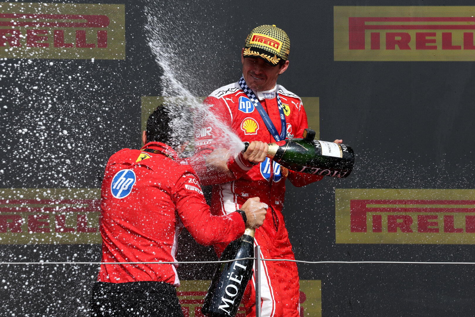 GP GRAN BRETAGNA, Gara winner Charles Leclerc (MON) Ferrari celebrates on the podium with Bryan Bozzi (ITA) Ferrari Gara Engineer.
05.07.2026. Formula 1 World Championship, Rd 9, British Grand Prix, Silverstone, England, Gara Day.
- www.xpbimages.com, EMail: requests@xpbimages.com © Copyright: Moy / XPB Images