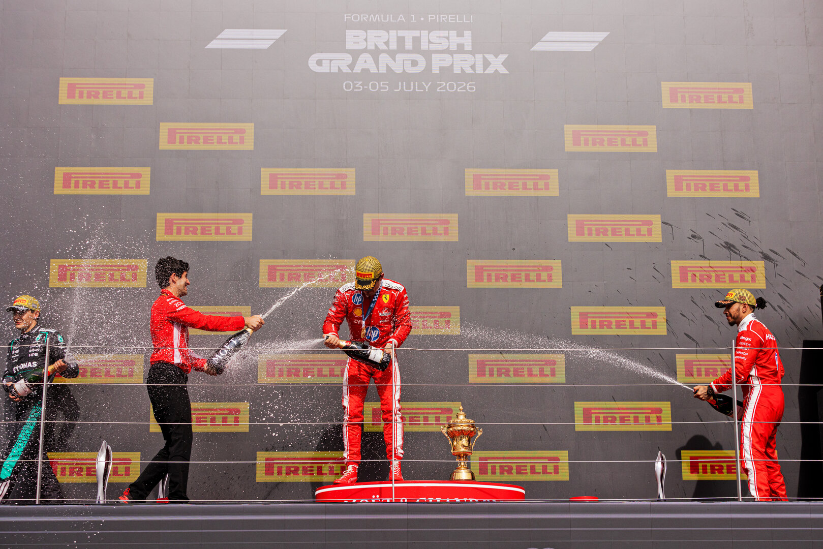 GP GRAN BRETAGNA, The podium (L to R): Bryan Bozzi (ITA) Ferrari Gara Engineer; Charles Leclerc (MON) Ferrari, vincitore; Lewis Hamilton (GBR) Ferrari, third
05.07.2026. Formula 1 World Championship, Rd 9, British Grand Prix, Silverstone, England, Gara Day.
 - www.xpbimages.com, EMail: requests@xpbimages.com © Copyright: Denny / XPB Images