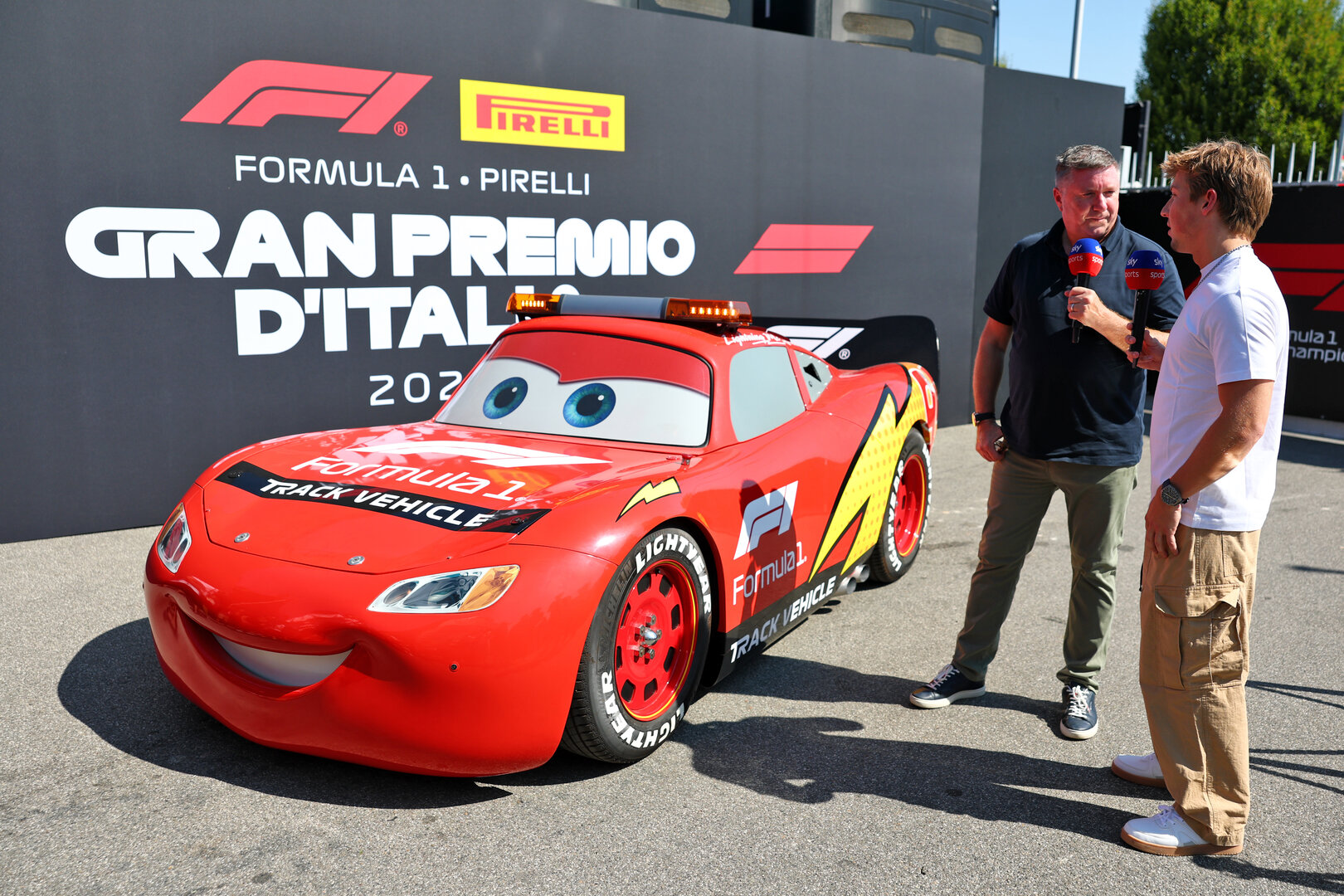 GP ITALIA, (L to R): Lightning McQueen (USA) Stock Car with David Croft (GBR) Sky Sports F1 Commentator e Liam Lawson (NZL) Red Bull Racing.
03.09.2026. Formula 1 World Championship, Rd 13, Italian Grand Prix, Monza, Italy, Preparation Day.
- www.xpbimages.com, EMail: requests@xpbimages.com © Copyright: Bearne / XPB Images