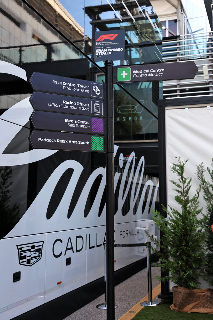 GP ITALIA, Paddock Atmosfera - Direction signs beside Cadillac Formula 1 Team trucks.
03.09.2026. Formula 1 World Championship, Rd 13, Italian Grand Prix, Monza, Italy, Preparation Day.
 - www.xpbimages.com, EMail: requests@xpbimages.com © Copyright:  Rew / XPB Images