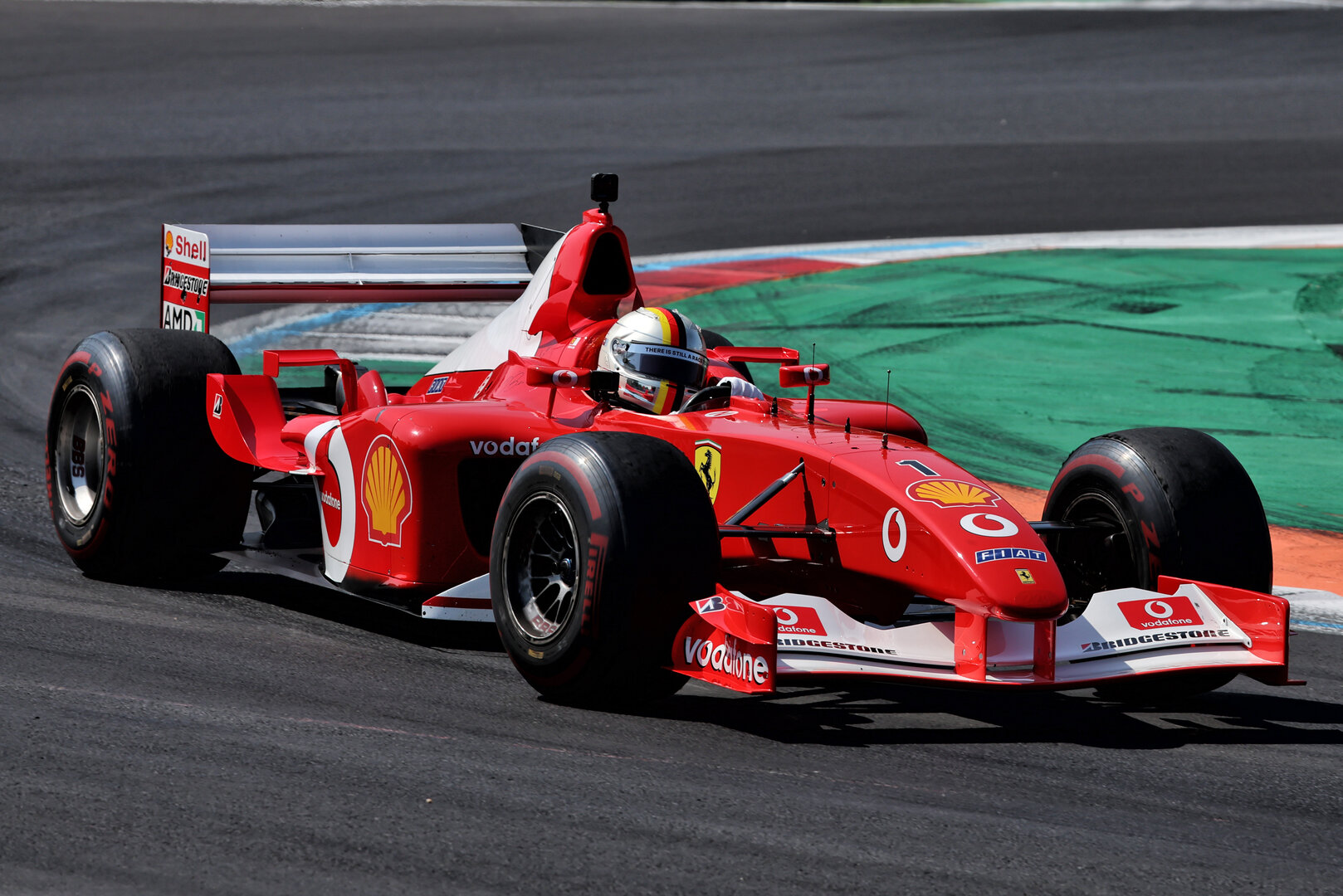 GP ITALIA, Sebastian Vettel (GER) drives the 2002 Ferrari F2002.
06.09.2026. Formula 1 World Championship, Rd 13, Italian Grand Prix, Monza, Italy, Gara Day.
- www.xpbimages.com, EMail: requests@xpbimages.com © Copyright: Rew / XPB Images