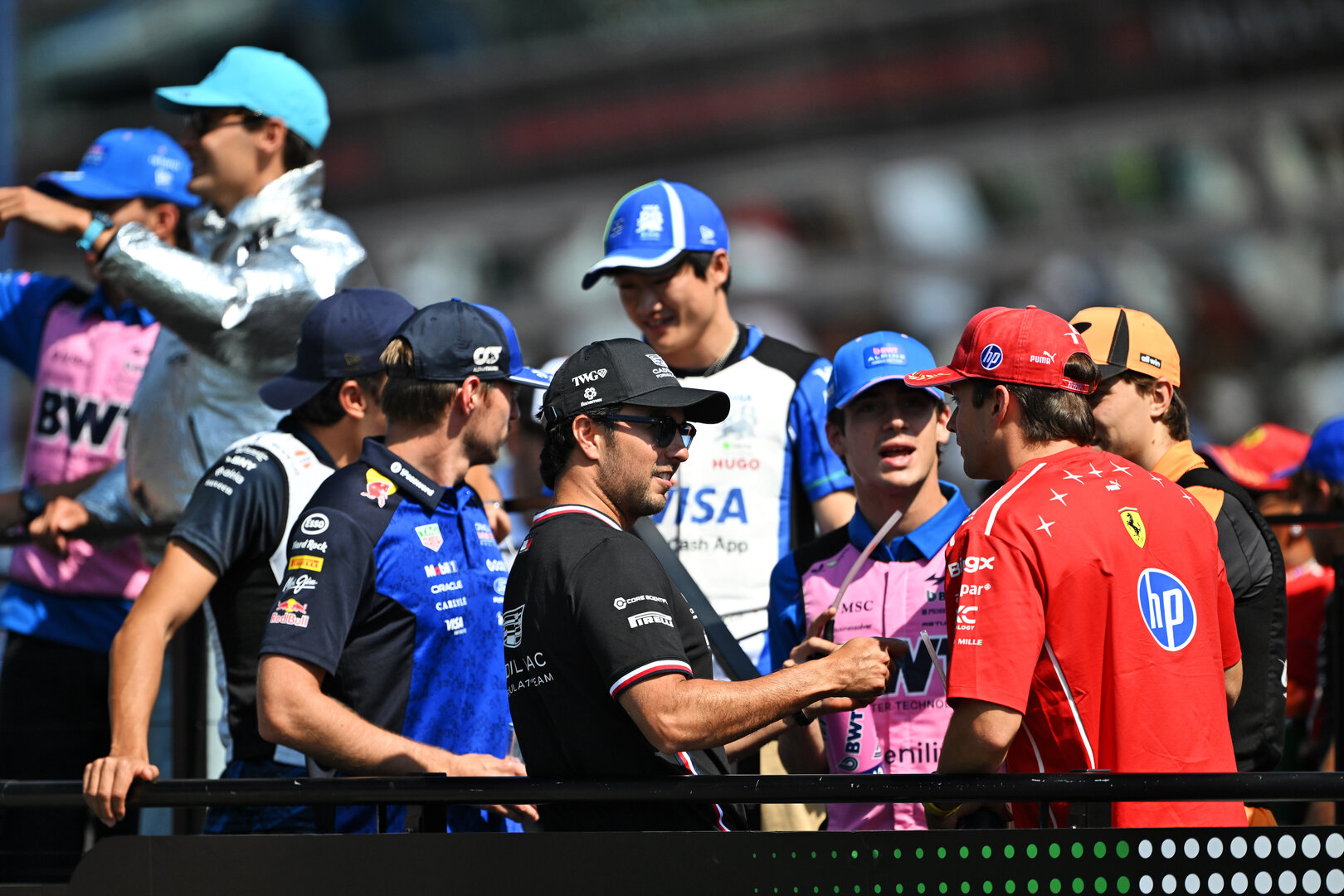 GP ITALIA, (L to R): Sergio Perez (MEX) Cadillac Formula 1 Team with Charles Leclerc (MON) Ferrari on the drivers' parade.
06.09.2026. Formula 1 World Championship, Rd 13, Italian Grand Prix, Monza, Italy, Gara Day.
- www.xpbimages.com, EMail: requests@xpbimages.com © Copyright: Price / XPB Images