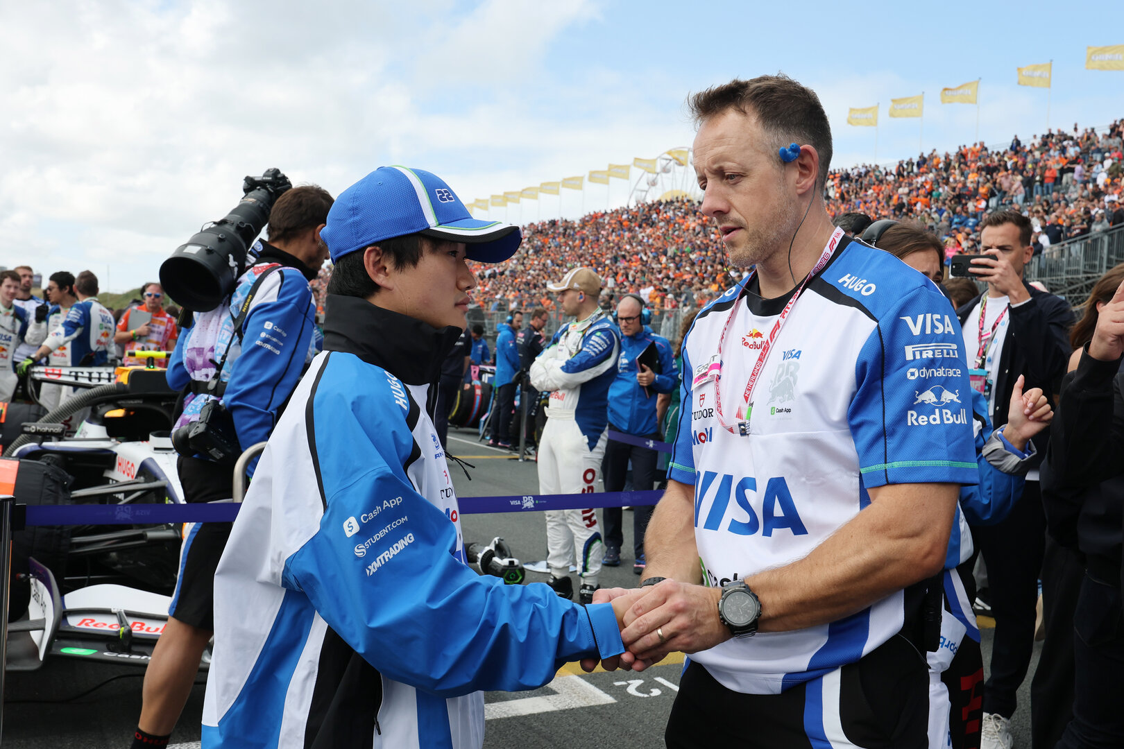 GP OLANDA, (L to R): Yuki Tsunoda (JPN) Racing Bulls Reserve Driver with Declan Foley (GBR) Racing Bulls Formula One Team Performance Coach on the grid.
22.08.2026. Formula 1 World Championship, Rd 12, Dutch Grand Prix, Zandvoort, Netherlands, Sprint e Qualifiche Day.
- www.xpbimages.com, EMail: requests@xpbimages.com © Copyright: Moy / XPB Images