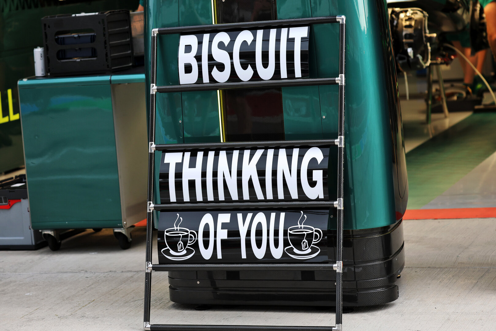 GP UNGHERIA, A pit board sending best wishes to Mick 'Biscuit' Fern (GBR) Aston Martin F1 Team Tyre Technician.
23.07.2026. Formula 1 World Championship, Rd 11, Hungarian Grand Prix, Budapest, Hungary, Preparation Day.
- www.xpbimages.com, EMail: requests@xpbimages.com © Copyright: Batchelor / XPB Images