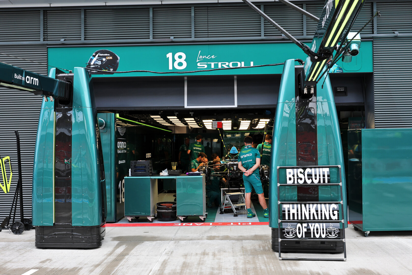 GP UNGHERIA, A pit board sending best wishes to Mick 'Biscuit' Fern (GBR) Aston Martin F1 Team Tyre Technician. 
23.07.2026. Formula 1 World Championship, Rd 11, Hungarian Grand Prix, Budapest, Hungary, Preparation Day.
- www.xpbimages.com, EMail: requests@xpbimages.com © Copyright: Moy / XPB Images