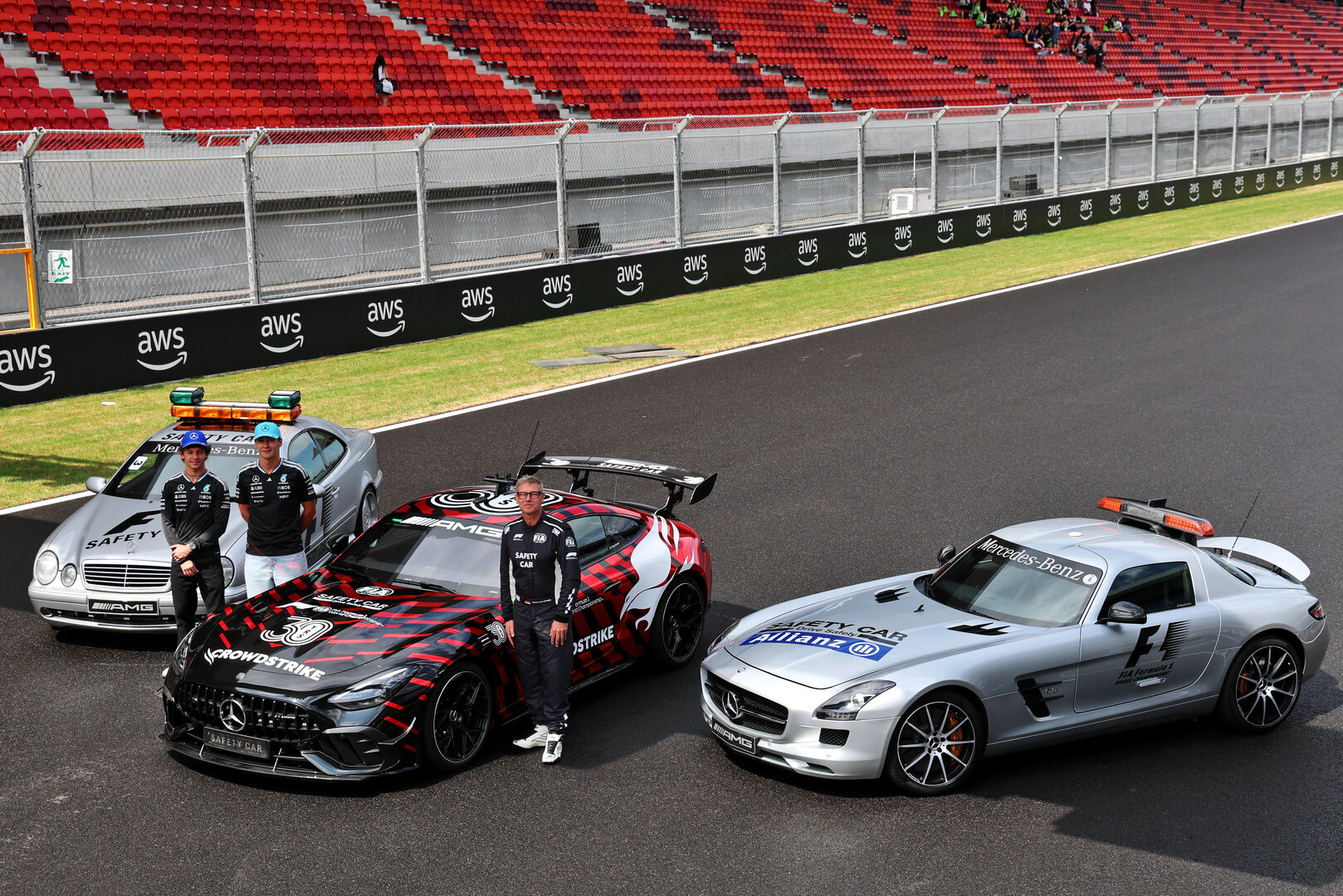 GP UNGHERIA, (L to R): Andrea Kimi Antonelli (ITA) Mercedes AMG Formula One Team; George Russell (GBR) Mercedes AMG Formula One Team; e Bernd Maylander (GER) FIA Safety Car Driver, celebrate 30 years of the Mercedes FIA Safety Car. 
23.07.2026. Formula 1 World Championship, Rd 11, Hungarian Grand Prix, Budapest, Hungary, Preparation Day.
- www.xpbimages.com, EMail: requests@xpbimages.com © Copyright: Batchelor / XPB Images