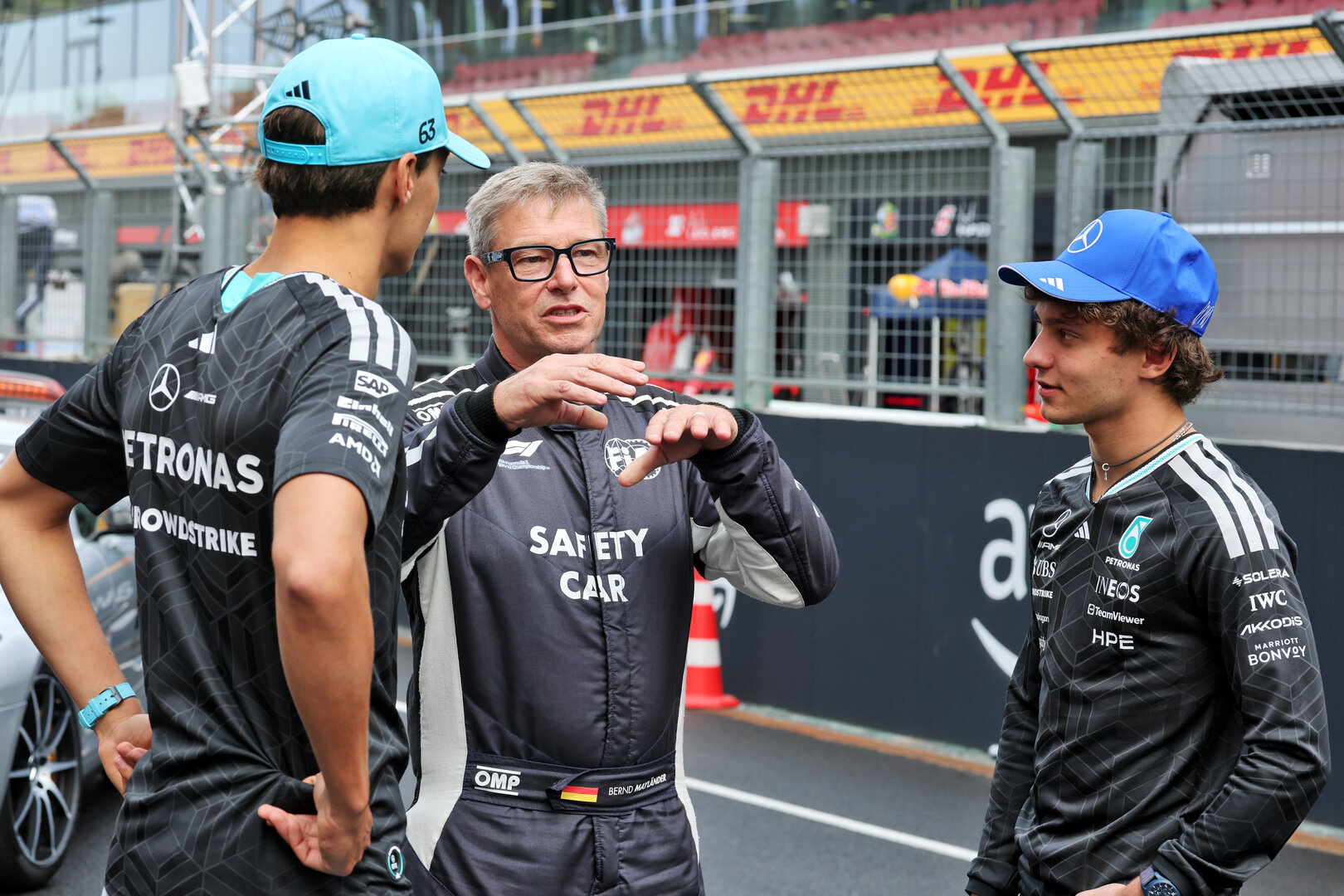 GP UNGHERIA, (L to R): George Russell (GBR) Mercedes AMG Formula One Team; Bernd Maylander (GER) FIA Safety Car Driver; e Andrea Kimi Antonelli (ITA) Mercedes AMG Formula One Team, celebrate 30 years of the Mercedes FIA Safety Car. 
23.07.2026. Formula 1 World Championship, Rd 11, Hungarian Grand Prix, Budapest, Hungary, Preparation Day.
- www.xpbimages.com, EMail: requests@xpbimages.com © Copyright: Moy / XPB Images
