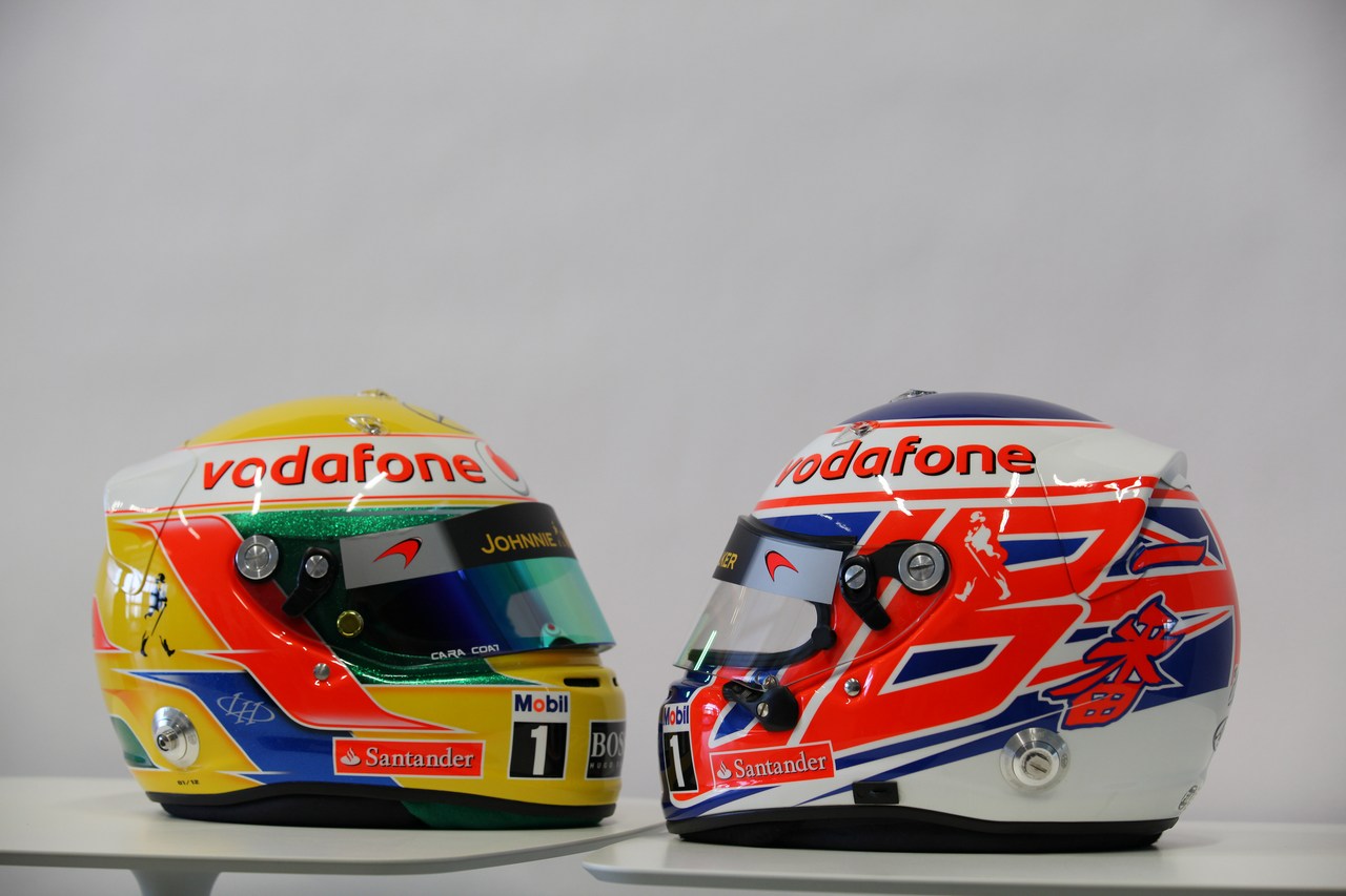 Lewis Hamilton (GBR), McLaren Mercedes and Jenson Button (GBR), McLaren Mercedes, helmets - Vodafone McLaren Mercedes MP4-27 launch, McLaren Technology Centre 