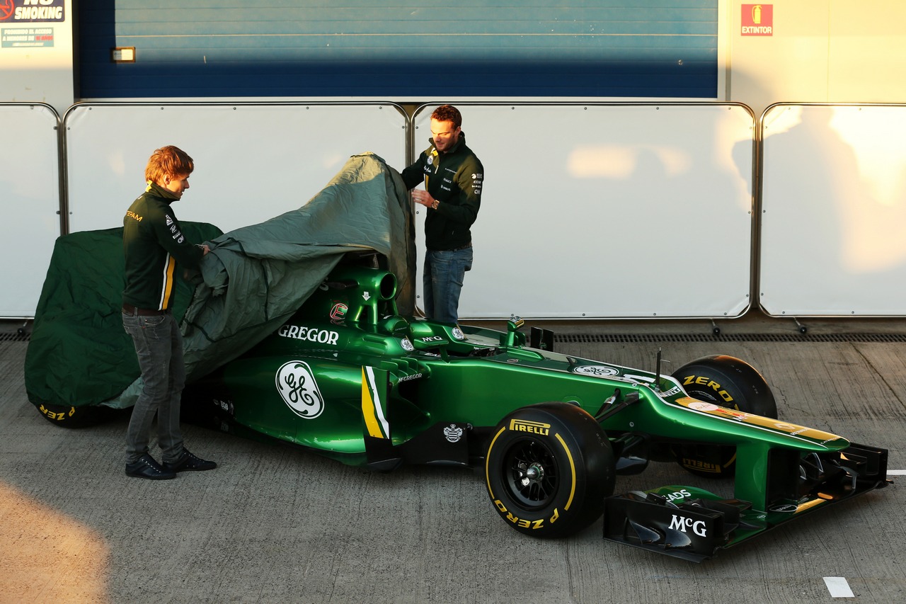 (L to R): Charles Pic (FRA) Caterham and team mate Giedo van der Garde (NLD) Caterham F1 Team unveil the new Caterham CT03.
