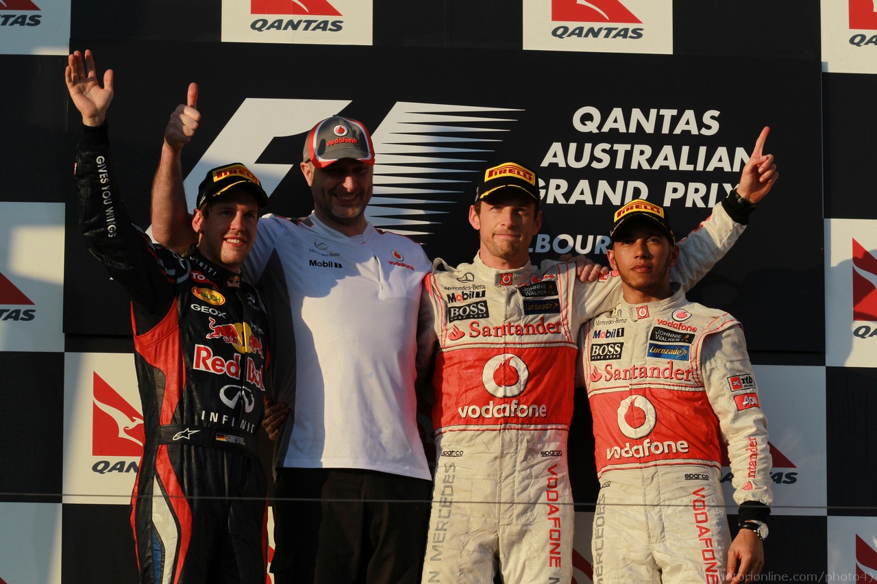 2nd place Sebastian Vettel (GER), Red Bull Racing with 1st place Jenson Button (GBR), McLaren Mercedes and 3rd place Lewis Hamilton (GBR), McLaren Mercedes 
