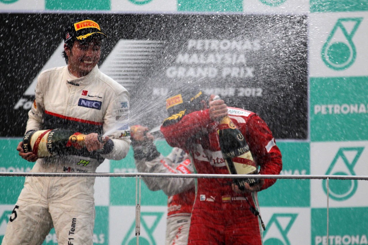 25.03.2012- Race, Fernando Alonso (ESP) Scuderia Ferrari F2012 race winner, 2nd position Sergio Pérez (MEX) Sauber F1 Team C31 and 3rd position Lewis Hamilton (GBR) McLaren Mercedes MP4-27 