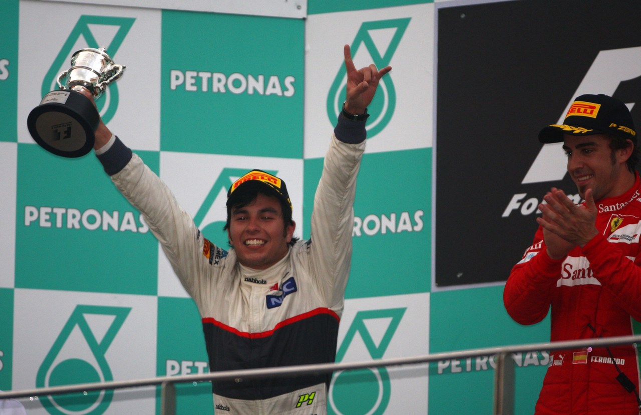 25.03.2012- Race, Sergio Pérez (MEX) Sauber F1 Team C31 2nd position and Fernando Alonso (ESP) Scuderia Ferrari F2012 race winner 