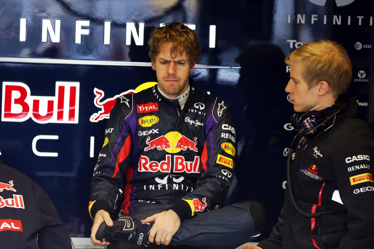 Sebastian Vettel (GER) Red Bull Racing with Heikki Huovinen (FIN) Personal Trainer.
