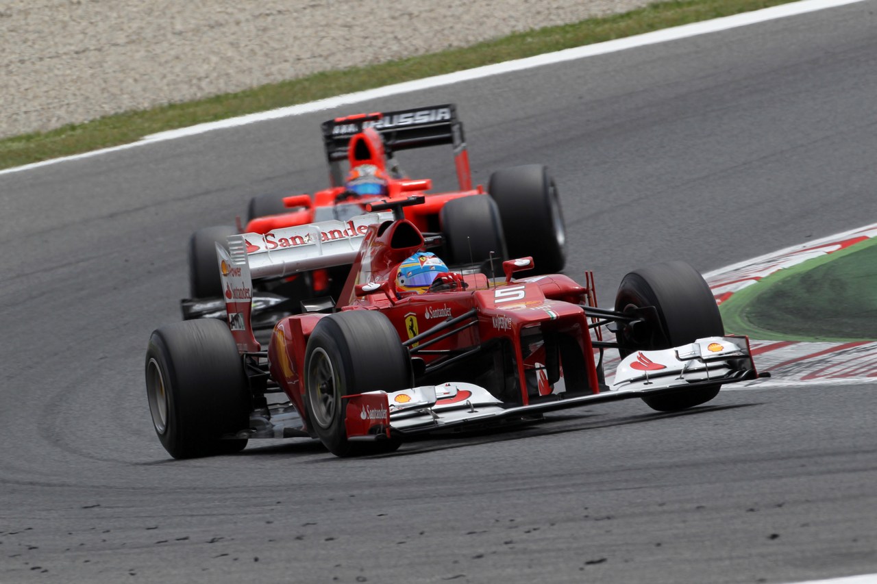 13.05.2012- Race, Fernando Alonso (ESP) Scuderia Ferrari F2012 leads Timo Glock (GER) Marussia F1 Team MR01 