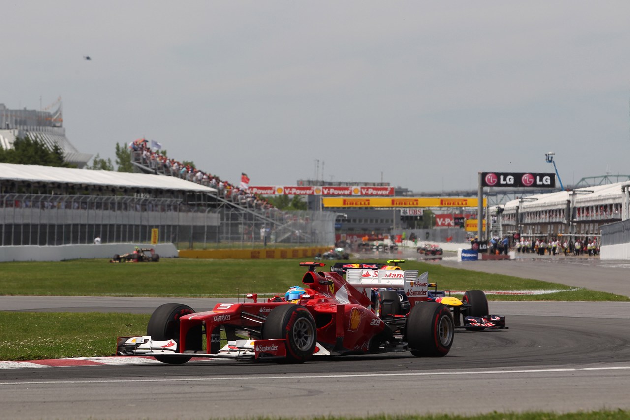 10.06.2012- Race, Fernando Alonso (ESP) Scuderia Ferrari F2012 leads Mark Webber (AUS) Red Bull Racing RB8 