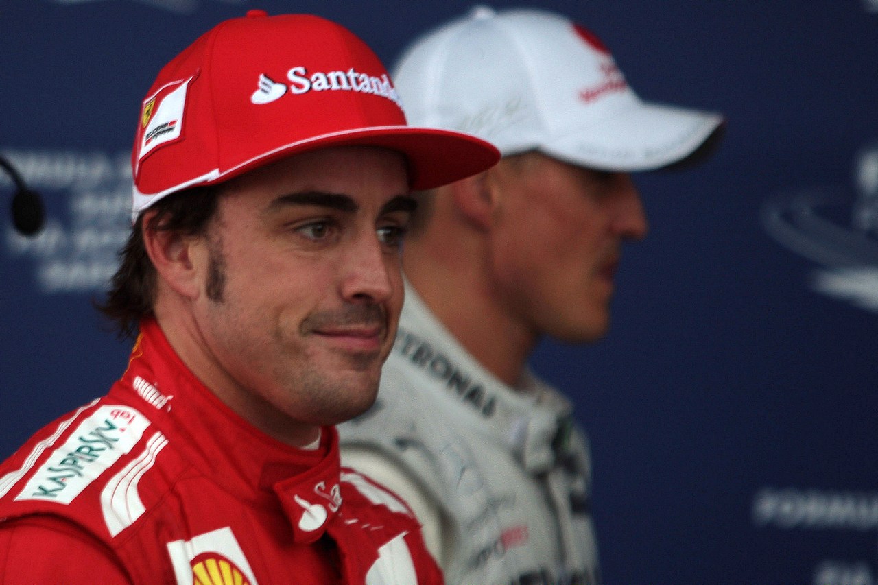07.07.2012- Qualifying, Fernando Alonso (ESP) Scuderia Ferrari F2012 pole position and Michael Schumacher (GER) Mercedes AMG F1 W03 3rd position 