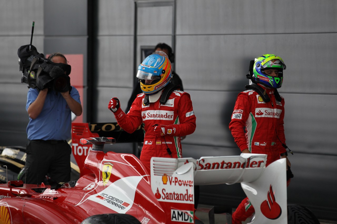 07.07.2012- Qualifying, Fernando Alonso (ESP) Scuderia Ferrari F2012 pole position and Felipe Massa (BRA) Scuderia Ferrari F2012 