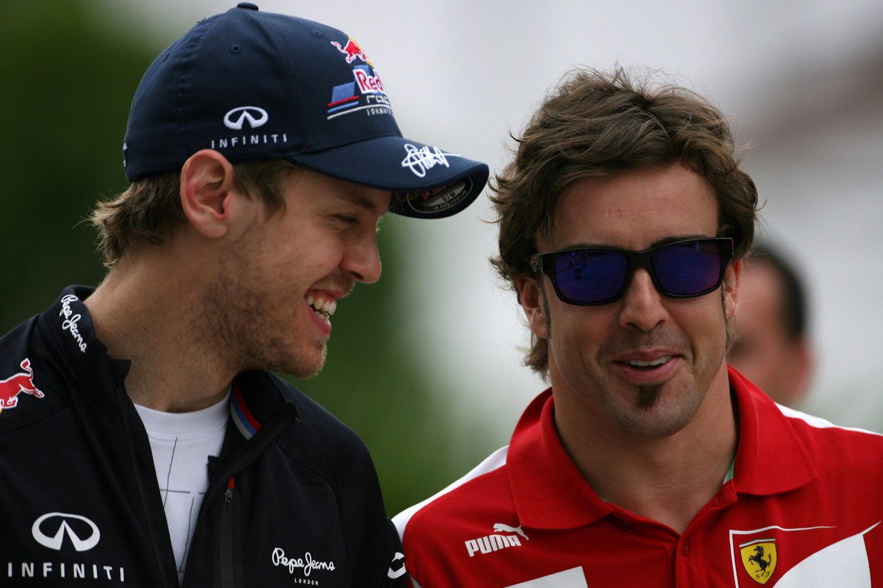 23.03.2012- Sebastian Vettel (GER) Red Bull Racing RB8 and Fernando Alonso (ESP) Scuderia Ferrari F2012 