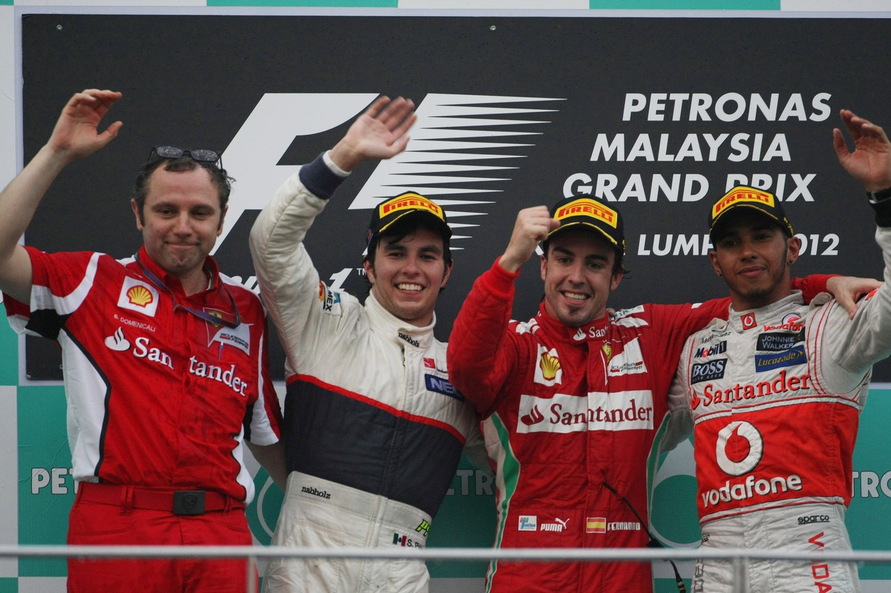 25.03.2012- Race, Fernando Alonso (ESP) Scuderia Ferrari F2012 race winner, Sergio Pérez (MEX) Sauber F1 Team C31 2nd position and Lewis Hamilton (GBR) McLaren Mercedes MP4-27 3rd position with Stefano Domenicali (ITA), Team Principal 