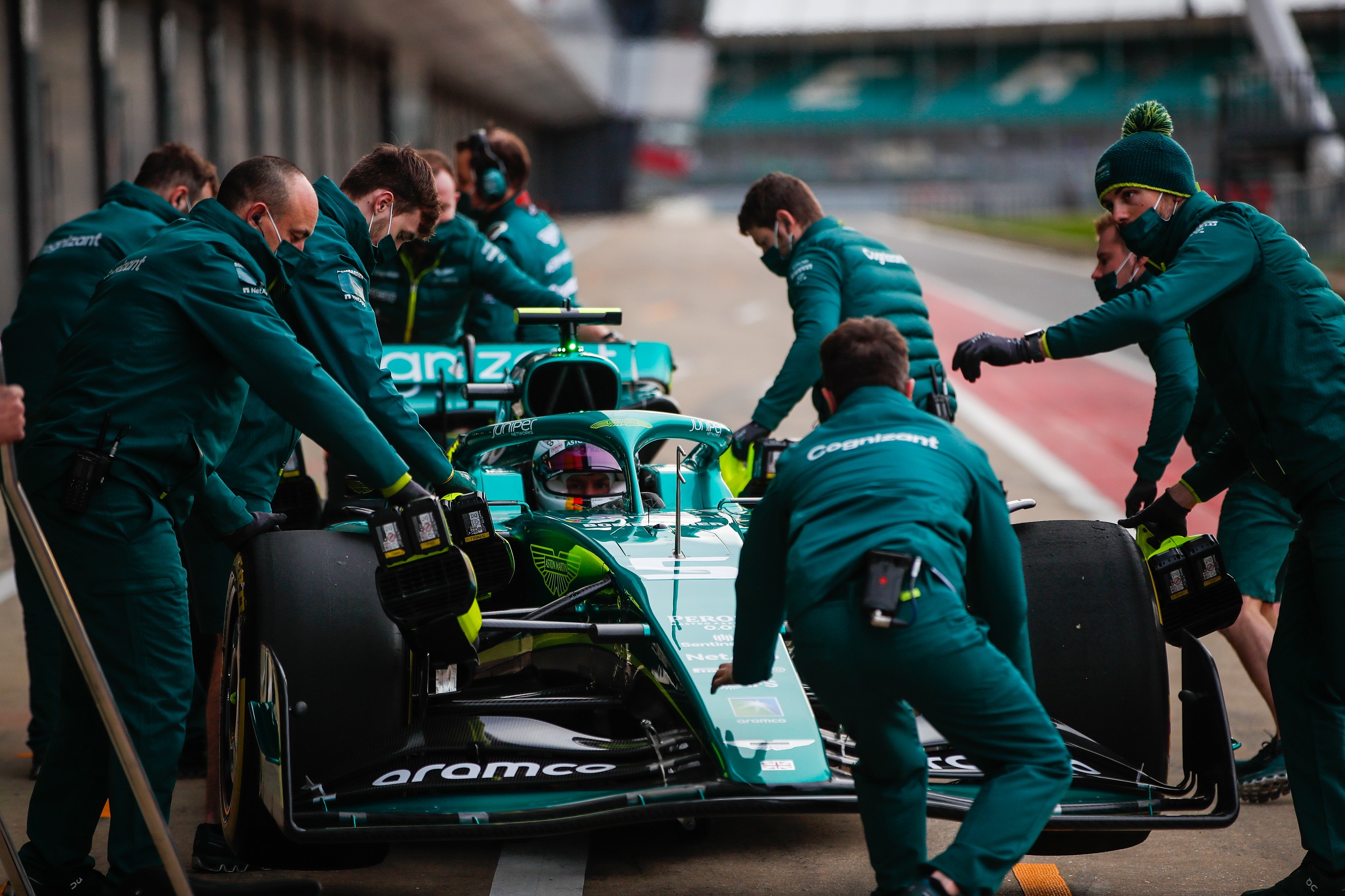 Sebastian Vettel, Aston Martin, stops outside of the team's pit garage