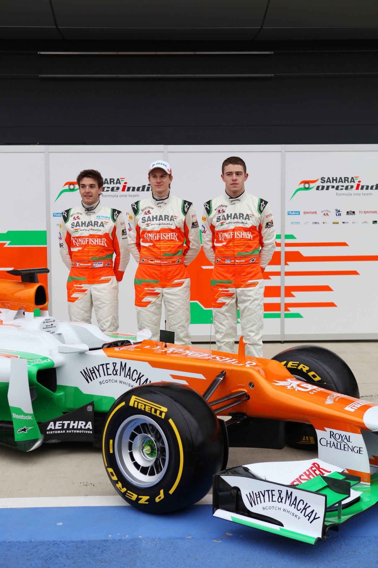 Jules Bianchi (FRA) with Nico Hulkenberg (GER) and Paul di Resta (GBR) -  Sahara Force India Formula One Team - VJM05 Launch - Silverstone, UK, 03.02.2012 -  Sahara Force India Formula One Team Copyright Free Image