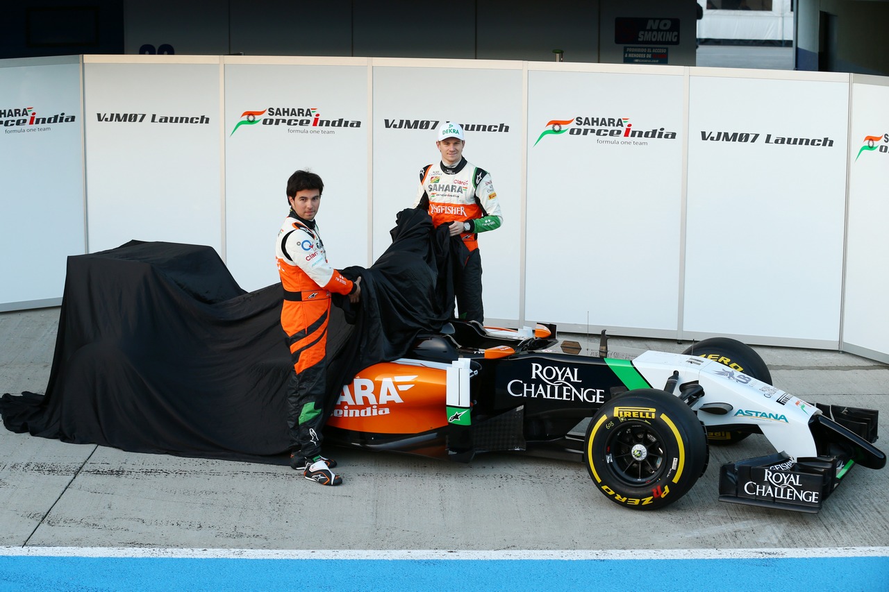 (L to R): Sergio Perez (MEX) Sahara Force India F1 and team mate Nico Hulkenberg (GER) Sahara Force India F1 unveil the new Sahara Force India F1 VJM07.
28.01.2014. Formula One Testing, Day One, Jerez, Spain.