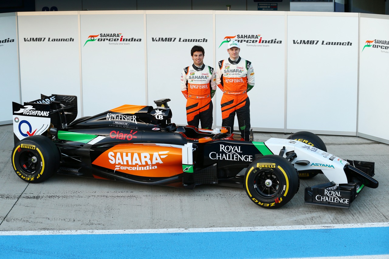 (L to R): Sergio Perez (MEX) Sahara Force India F1 and team mate Nico Hulkenberg (GER) Sahara Force India F1 unveil the new Sahara Force India F1 VJM07.
28.01.2014. Formula One Testing, Day One, Jerez, Spain.