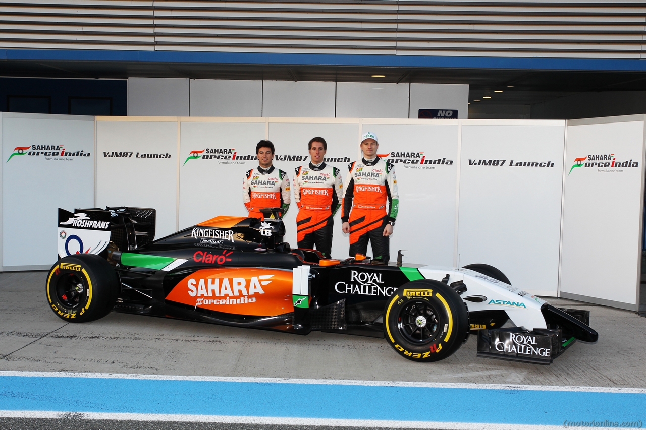 (L to R): Sergio Perez (MEX) Sahara Force India F1; Daniel Juncadella (ESP) Sahara Force India F1 Team Test and Reserve Driver and team mate Nico Hulkenberg (GER) Sahara Force India F1 at the launch of the new Sahara Force India F1 VJM07. 
28.01.2014. Formula One Testing, Day One, Jerez, Spain.