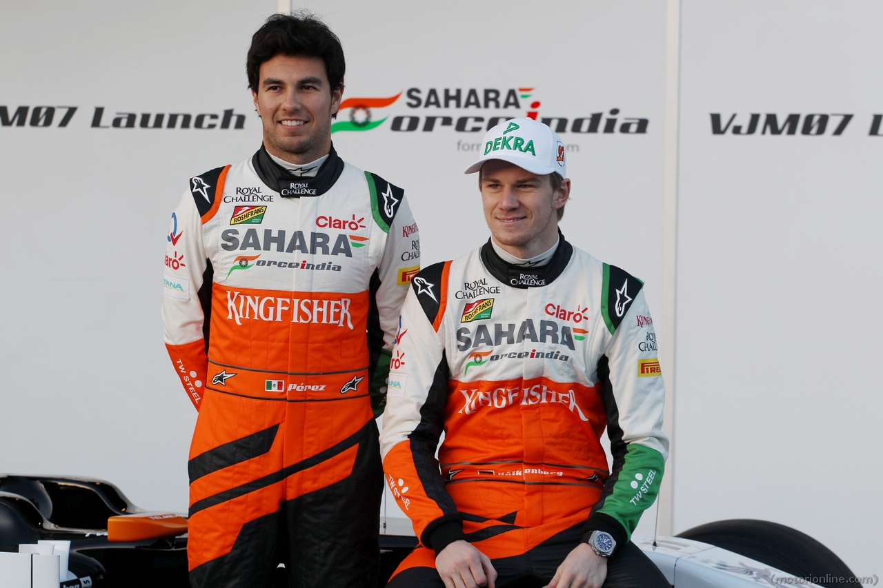 (L to R): Sergio Perez (MEX) Sahara Force India F1 and Nico Hulkenberg (GER) Sahara Force India F1 at the launch of the new Sahara Force India F1 VJM07. 
28.01.2014. Formula One Testing, Day One, Jerez, Spain.