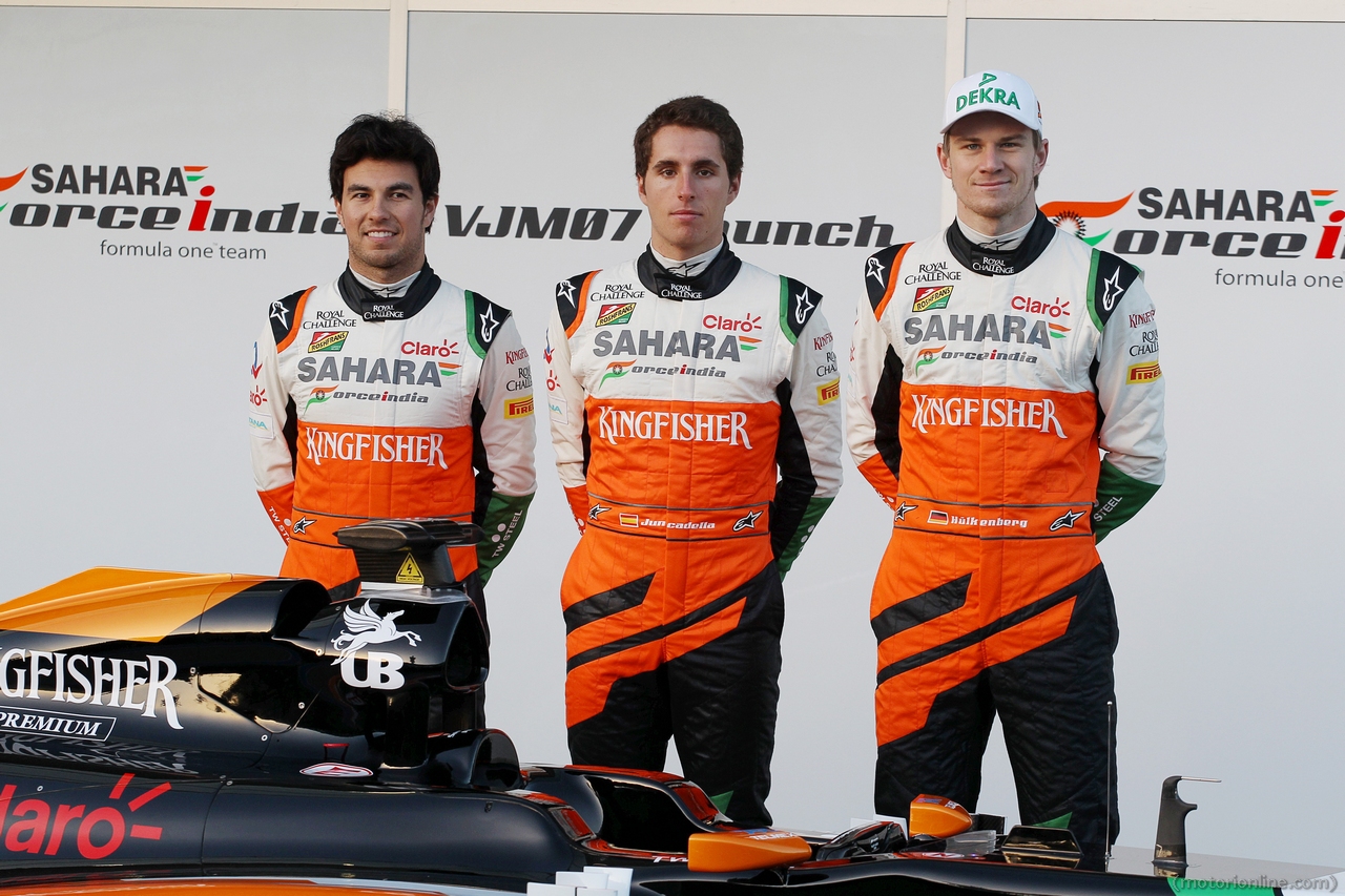 (L to R): Sergio Perez (MEX) Sahara Force India F1; Daniel Juncadella (ESP) Sahara Force India F1 Team Test and Reserve Driver; and Nico Hulkenberg (GER) Sahara Force India F1 at the launch of the new Sahara Force India F1 VJM07. 
28.01.2014. Formula One Testing, Day One, Jerez, Spain.