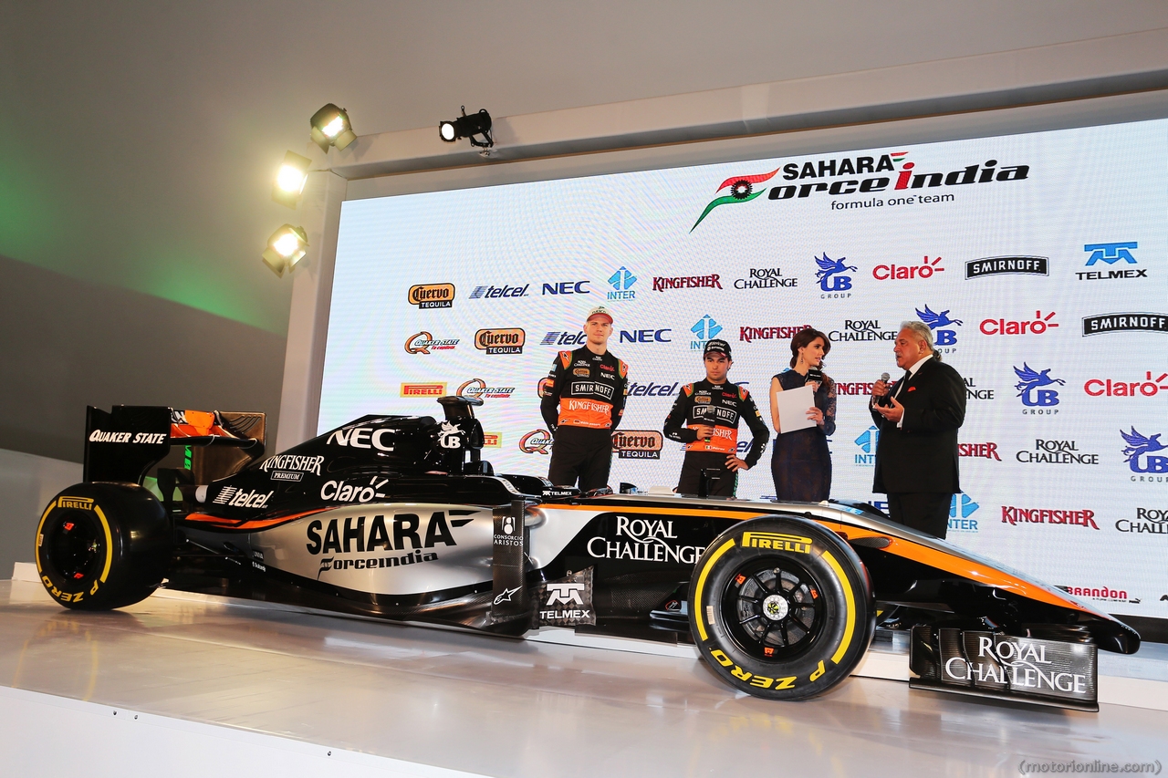 (L to R): Nico Hulkenberg (GER) Sahara Force India F1 with team mate Sergio Perez (MEX) Sahara Force India F1 and Dr. Vijay Mallya (IND) Sahara Force India F1 Team Owner.
21.01.2015.