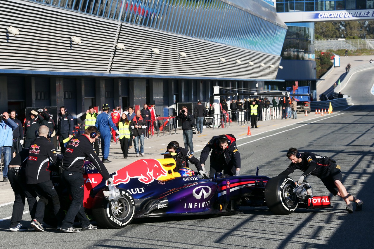 Mark Webber (AUS) Red Bull Racing pushed back in the pits.

