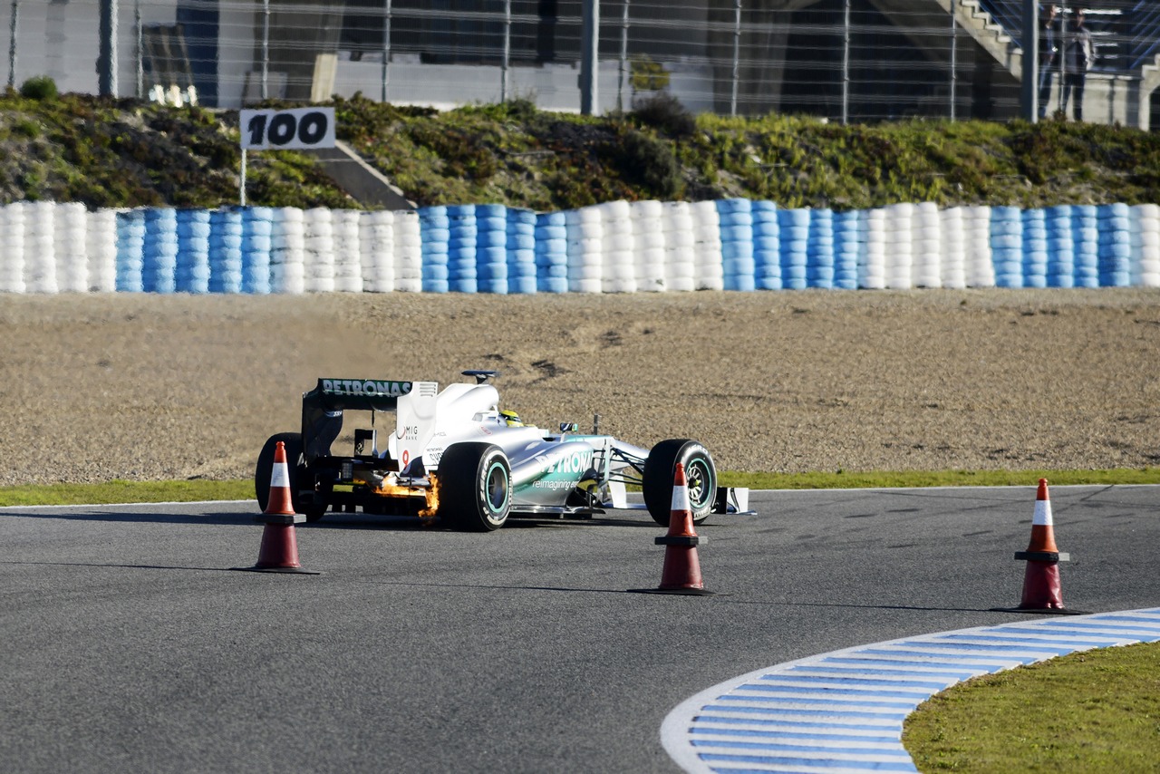 Nico Rosberg (GER) Mercedes AMG F1 W04 stops on the circuit with a small fire.

