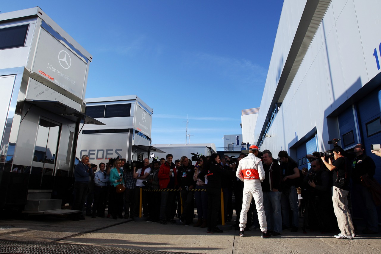 Jenson Button (GBR) McLaren with the media.
