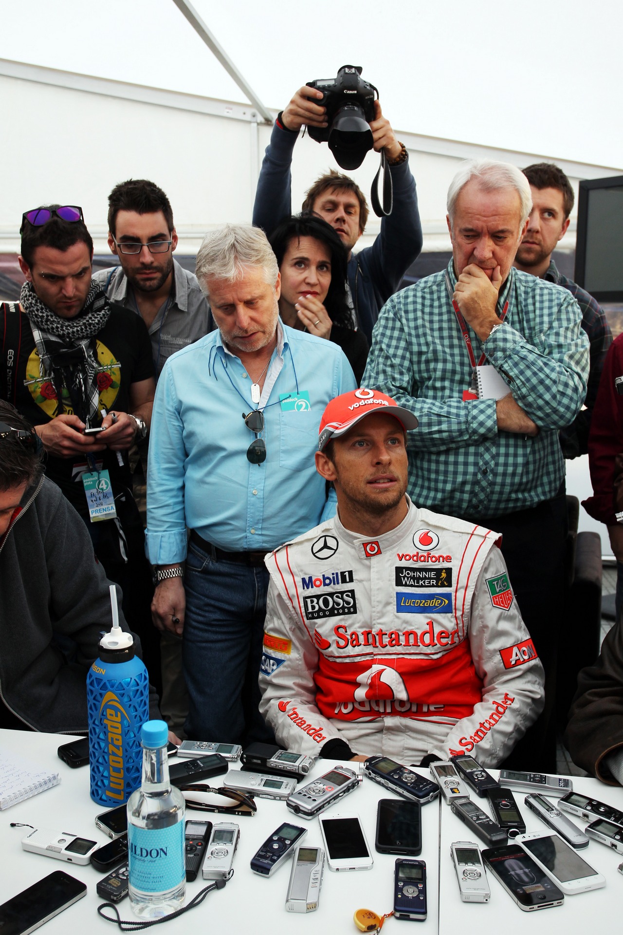 Jenson Button (GBR) McLaren with the media.
