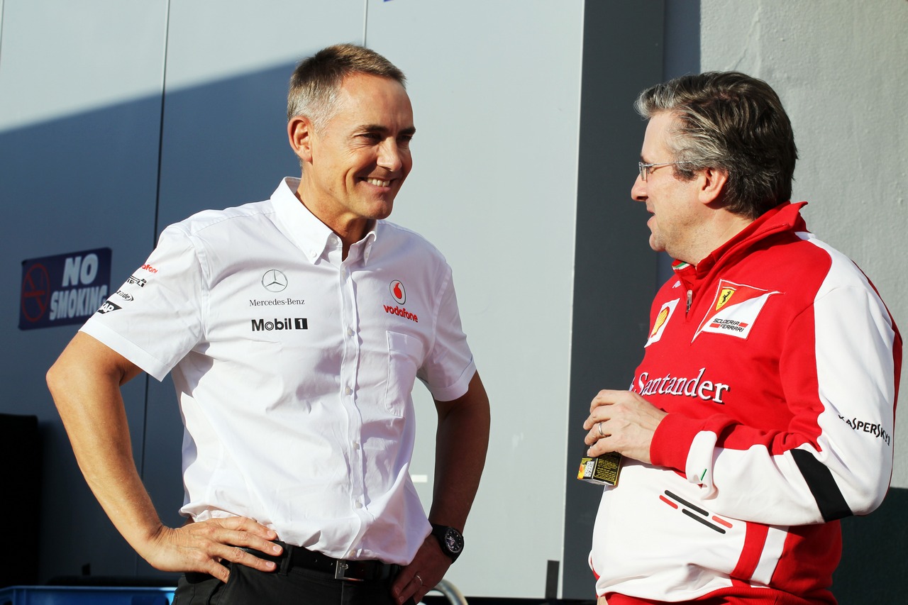 (L to R): Martin Whitmarsh (GBR) McLaren Chief Executive Officer with Pat Fry (GBR) Ferrari Deputy Technical Director and Head of Race Engineering.
