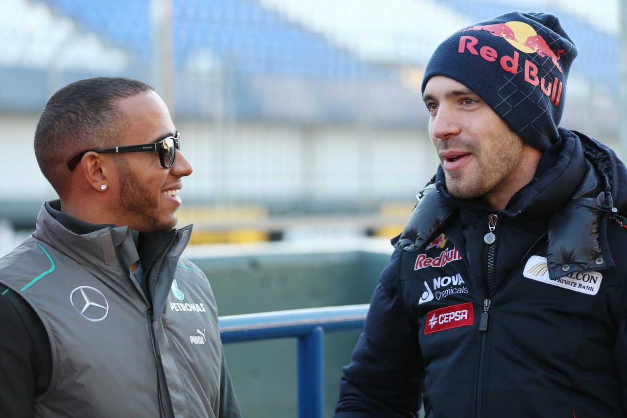 (L to R): Lewis Hamilton (GBR) Mercedes AMG F1 with Jean-Eric Vergne (FRA) Scuderia Toro Rosso.
