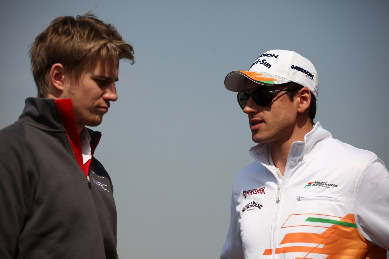 11.04.2013- Nico Hulkenberg (GER) Sauber F1 Team C32 Adrian Sutil (GER), Sahara Force India F1 Team VJM06 