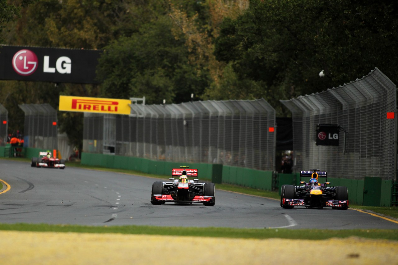 17.03.2013- Race, Sergio Perez (MEX) McLaren MP4-28 and Sebastian Vettel (GER) Red Bull Racing RB9