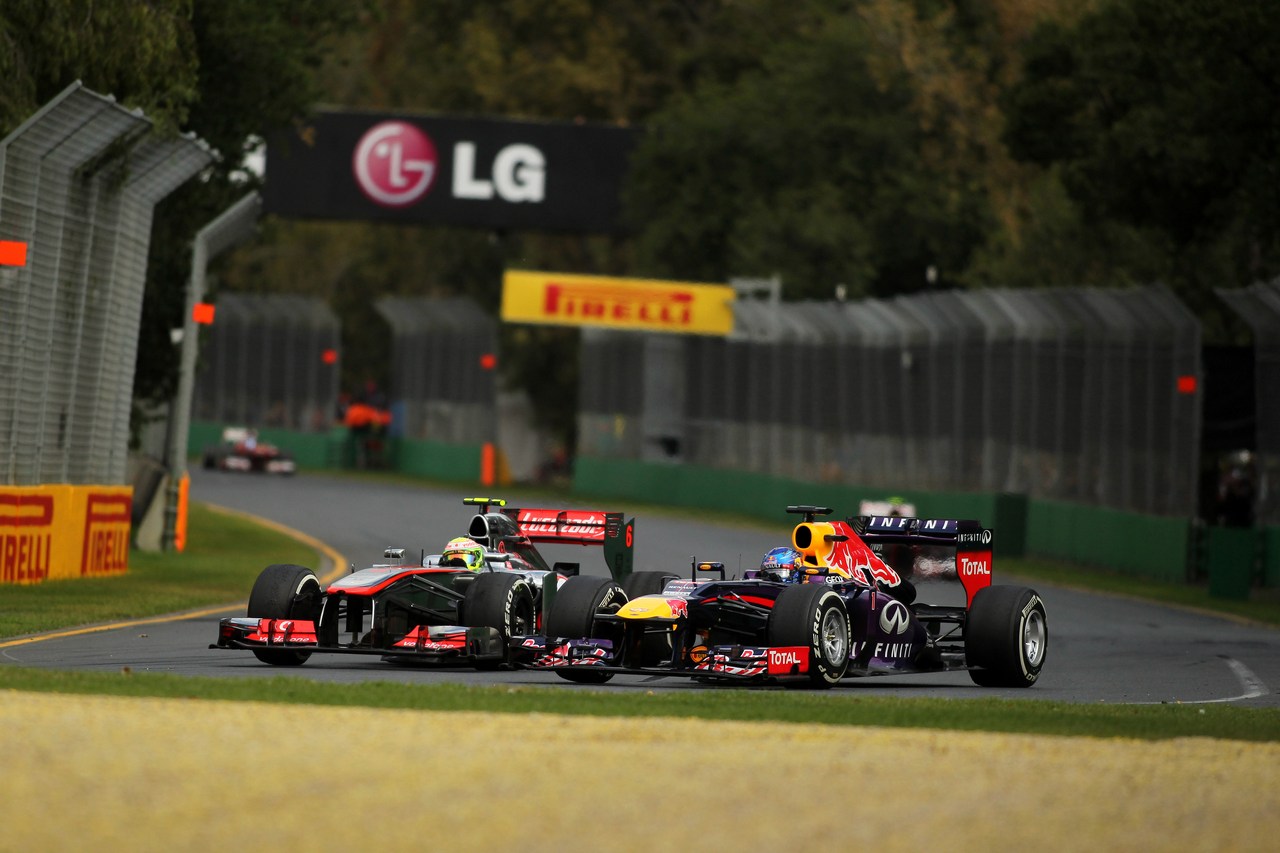 17.03.2013- Race, Sergio Perez (MEX) McLaren MP4-28 and Sebastian Vettel (GER) Red Bull Racing RB9 