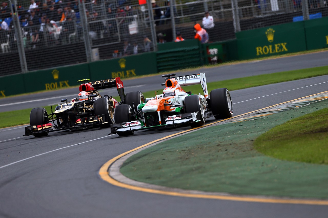17.03.2013- Race, Romain Grosjean (FRA) Lotus F1 Team E21 and Paul di Resta (GBR) Sahara Force India F1 Team VJM06 