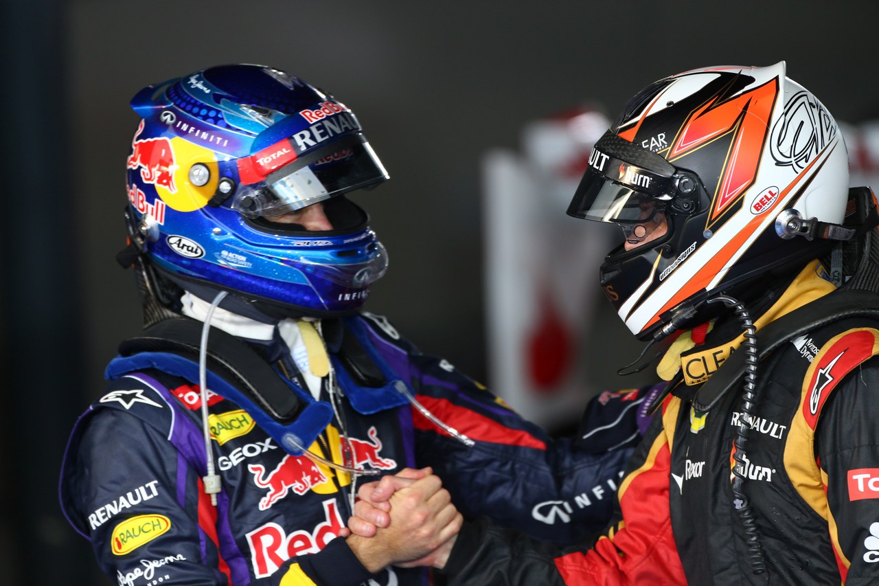 17.03.2013- Race, Sebastian Vettel (GER) Red Bull Racing RB9 and Kimi Raikkonen (FIN) Lotus F1 Team E21 race winner 