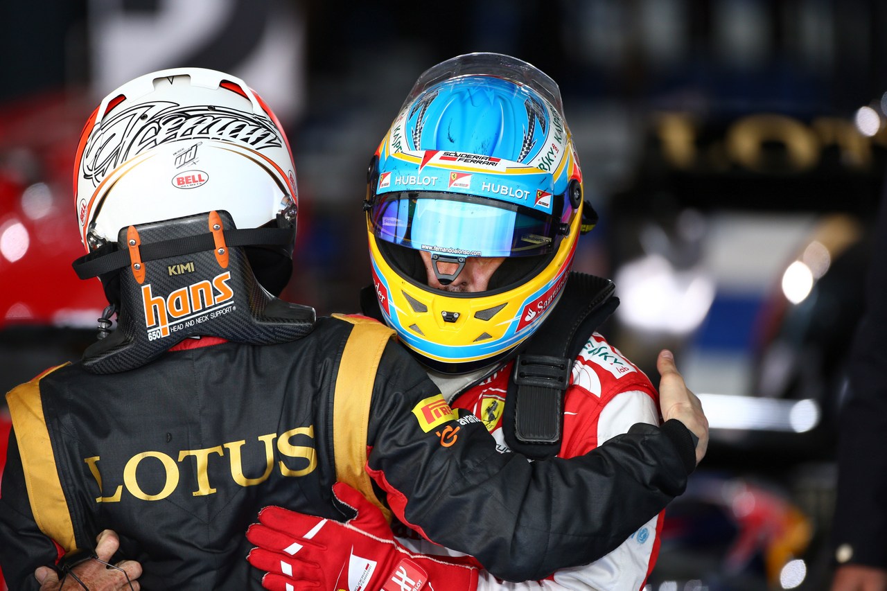 17.03.2013- Race, Kimi Raikkonen (FIN) Lotus F1 Team E21 race winner and Fernando Alonso (ESP) Scuderia Ferrari F138 2nd position 