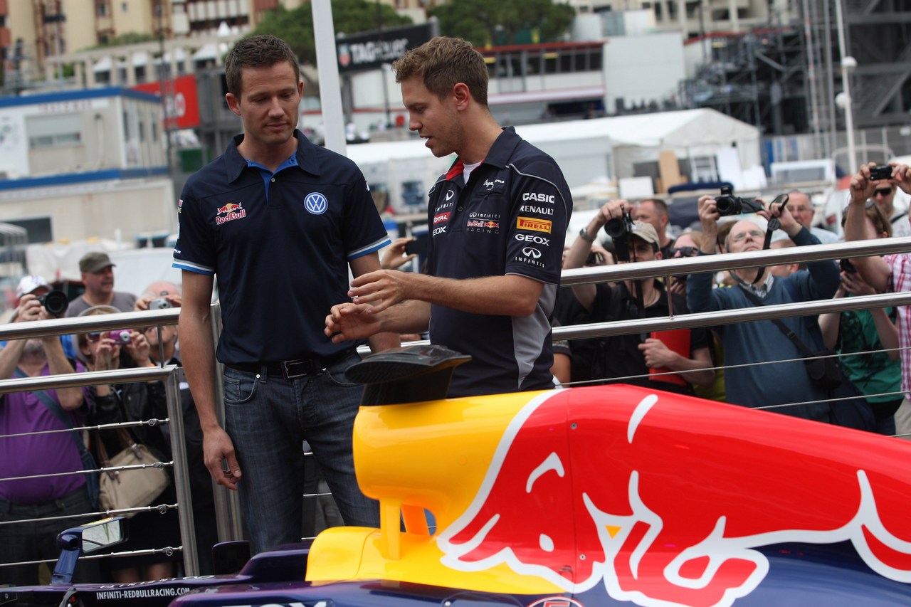 22.05.2013- Sebastian Vettel (GER) Red Bull Racing RB9 and Sebastien Ogier (F) WRC Driver