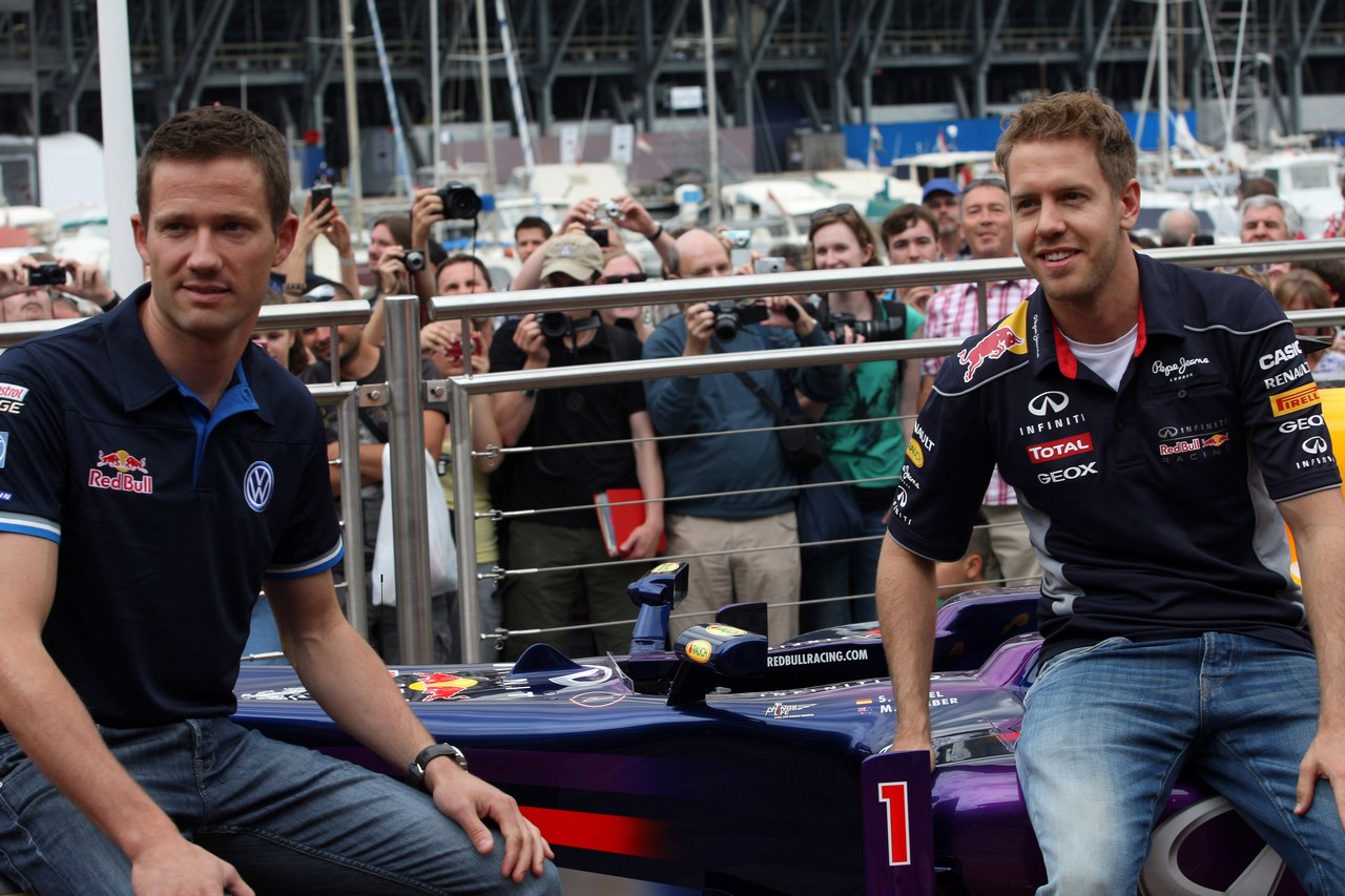 22.05.2013- Sebastian Vettel (GER) Red Bull Racing RB9 and Sebastien Ogier (F) WRC Driver
